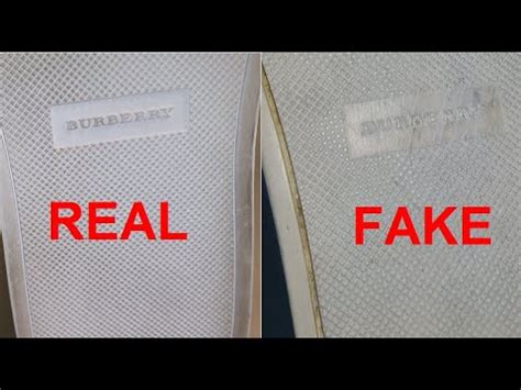 real vs fake burberry rain boots|burberry shoes logo.